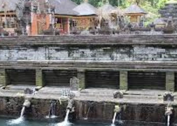 The Tirta Empul Temple, situated in the central region of Bali, is renowned for its sacred spring water, known as "Tirta."